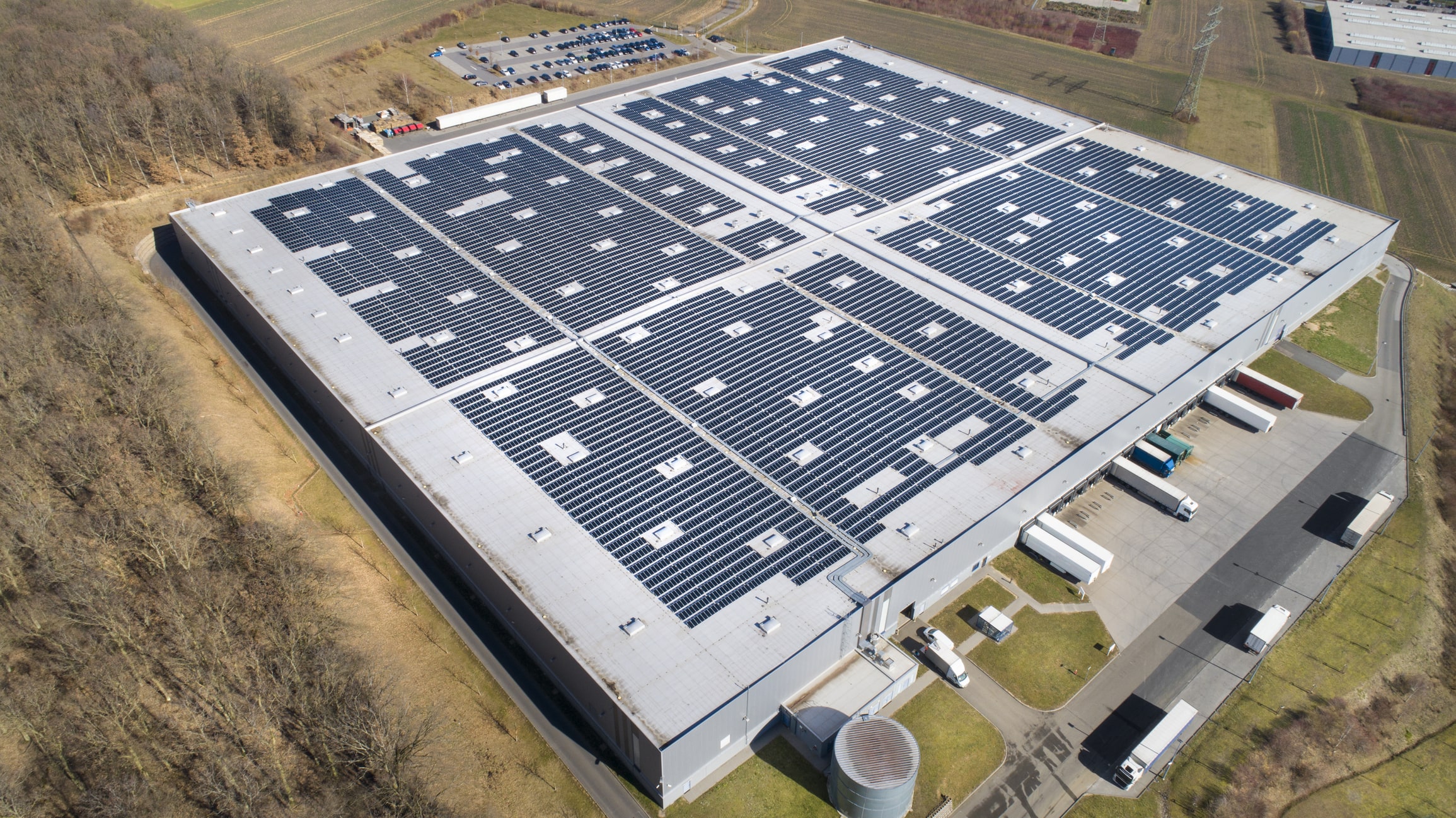 manufacturing plant with solar panels on the roof