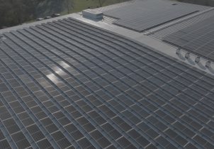 Solar array fills the rooftop for AESSEAl's North American headquarters.