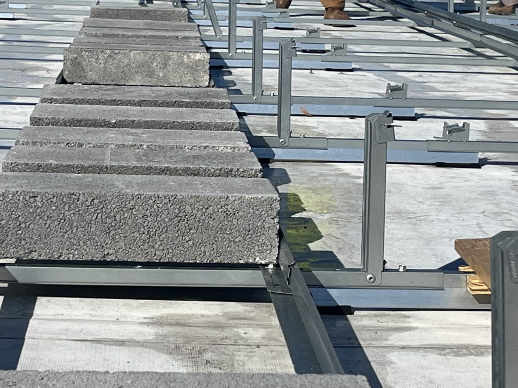 Ballasted racking on rooftop