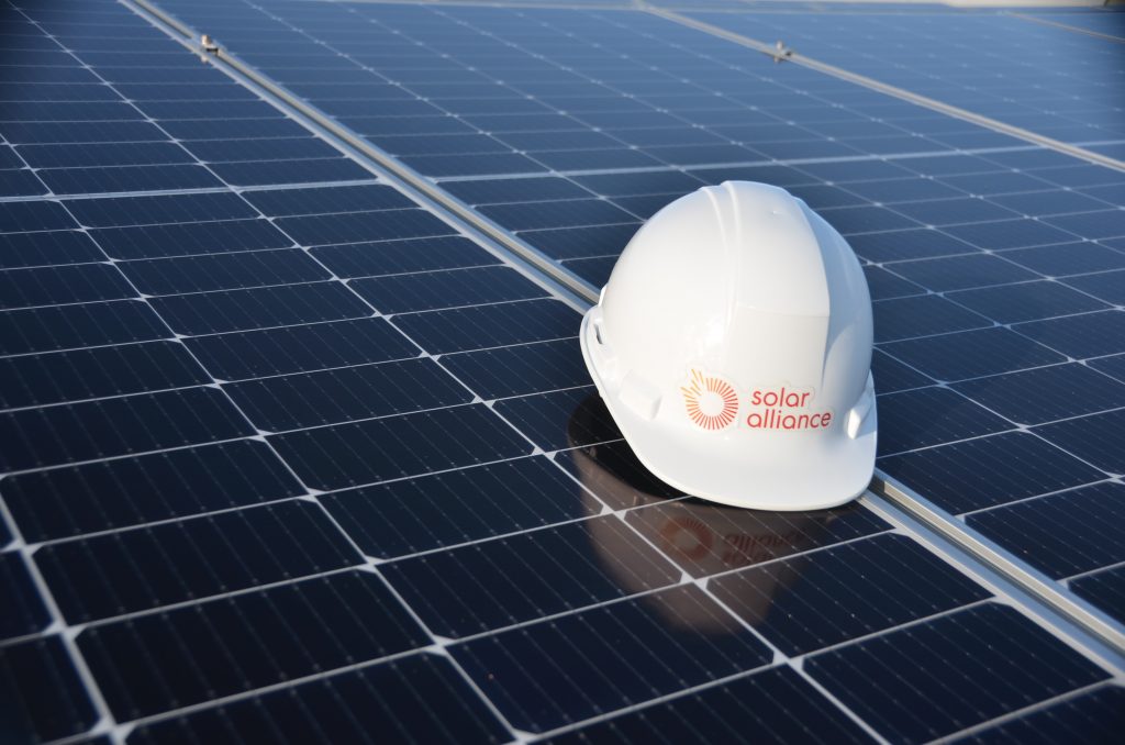 hard hat on solar array